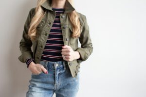 woman in green jacket
